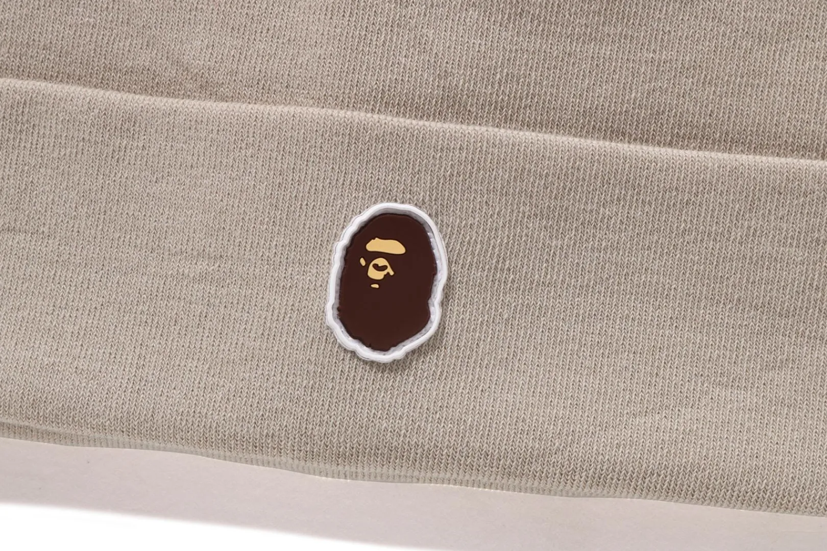 strickmtze_mit_silikonaffenkopf_2.webp 0ZX Strickmütze mit Silikon-Affenkopf Store